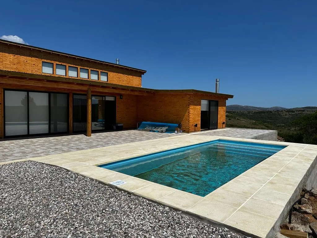 Natural wood villa with pool and mountains